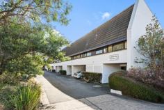  11C/3 Davies Place Torrens ACT 2607 $650,000 Tucked away in a quiet complex of 12 in the coveted suburb of Torrens, this distinctive 2-bedroom, 2-storey townhouse blends post-modern architectural elegance with retro 1970s vibes. Step into the kitchen and you're greeted by the vibrant walls and leafy outlook complementing the wooden cupboards. The kitchen's charm flows into the spacious dining and living area which are versatile spaces ready for your daily meals, grand dinner parties or curling up on the couch with a book. Whether you're home from work or school, the study nook is the perfect spot to get your work done. The living area offers a space which fills with natural light through the wide glass doors that open to the spacious patio. This paved oasis, framed by established trees for privacy, is perfect for entertaining friends or enjoying a quiet moment by yourself in the sun. Downstairs, all bedrooms have built-in robes and copious sunlight through the large windows that look across the garden. Also downstairs, the main bathroom features a full bath and tiling that echoes the home's unique character. This charming home is perfect for young families or downsizers alike. Located in a peaceful neighbourhood, walkable to the local shops and public transport, it offers the rare combination of quiet and convenience. The property's proximity to local schools and nature trails make it clear why Torrens is such a sought after suburb. This classic Canberra home is the perfect combination of "nothing more to do" and "so much potential". Whichever way you go, this townhouse will immediately feel like home. Your new home features: Architect designed by Dirk Bolt Central living area opens out to sunny north facing paved terrace Dual level layout separates living and accommodation zones Charming kitchen with treetop views All bedrooms have built in robes Main bathroom with separate bath/shower Reverse cycle split heating and cooling system in living room Separate laundry Storage nook underneath stairway and linen press by the bathroom Single carport with direct access to property and ample visitor parking Sunny outdoor terrace with treetop views and storage room Wonderful neighbours/community - a mix of younger families and long-term residents Quiet complex surrounded by trees Close to Mt Taylor's walking trail, Torrens shops, Torrens early learning and primary school, Southlands Shopping Centre, Marist College, Woden Westfield and Canberra Hospital. Quick walk to Athllon drive for bus connections to Tuggeranong, Woden, Civic, ANU and Belconnen. 