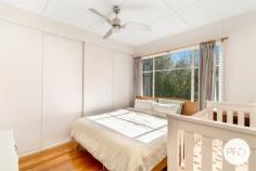  162 Roslyn Avenue Blackmans Bay TAS 7052 $695,000 - $735,000 Dive into the heart of tranquility with this whimsical abode, nestled where the sun's first rays tenderly kiss the earth. Picture this: a living room so bathed in morning light, it rivals the Sistine Chapel's ambiance (minus the tourists, of course). It's your personal sanctuary, where the outside world ceases to exist as you close off the space, making late-night TV binges guilt-free while the rest of your household slumbers in silent bliss. Heating this sun-drenched haven is a breeze, whether by the crackling romance of a fire or the modern whisper of a heat pump. And let's talk about privacy - it's like Fort Knox without the gold but with all the serenity. Your front and back yards are your secluded domains, untouched by prying eyes, offering a solace rarely found. Neighbours? Only the best kind: quiet, with stories etched in the lines of their faces and the warmth of family life humming from behind their walls. Yet, within this cocoon of calm, the vibrancy of life is but a step away. Your backyard transforms into a private oasis, a whisper away from the lapping waves of Blackmans Bay Beach. Imagine morning runs that lead to adventures along the Sun Coast Trail, with the salty breeze as your companion. For those leisurely strolls, Pup in tow, the quaint forest path to the north is like a scene from a storybook, leading to treasures untold. And let's not forget the culinary delights and cozy hangouts a stone's throw away - Pep Pizza, Eb & Flo, Salty Dog, and BoHo beckon with their inviting aromas and friendly smiles. Inside, the heart of this home beats with lived-in hardwood floors that tell tales of joy, laughter, and life lived to the fullest. Each bedroom is a sanctuary of light, promising rest and rejuvenation. And for those seeking solace, the deep tub awaits to envelop you in warmth and comfort. Outdoor living is redefined here, with a deck that begs for BBQs under the stars or lazy afternoons basking in the sun. And in a nod to the free spirits, yes, the level of privacy here means you can dance like nobody's watching, inside or out! 162 Roslyn Avenue isn't just a house; it's a lifestyle. A place where laughter fills the air, privacy cradles your soul, and the beach is your backyard. It's not just about living; it's about embracing life's joys, one sun-drenched, laughter-filled, and blissfully private moment at a time. 