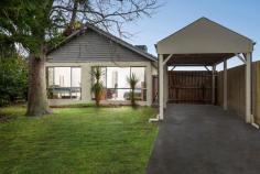  1 Graeme Street Frankston VIC 3199 $580,000 - $638,000 Discover the perfect family sanctuary with this charming three bedroom corner block home, ideally positioned within a vibrant community surrounded by schools and parks and only a short drive to Karingal Hub shopping and entertainment precinct. This spacious home offers an inviting open-plan living and dining area with a picturesque outlook, complemented by a modern kitchen featuring sleek white cabinetry, an island bench breakfast bar and stainless steel appliances including gas cooking. Each of the three generous bedrooms are equipped with built-in robes and are serviced by the stylish family bathroom boasting a large walk-in shower toilet and an additional powder room for added convenience. Comfort is assured year-round with ducted heating and evaporative cooling throughout. Step outside to an outdoor entertainment deck, seamlessly extending from the meals area, perfect for alfresco dining and relaxation. The low-maintenance courtyard and delightful front garden with mature trees provide serene outdoor spaces, while the single carport with additional off street parking adds practicality, completing this exceptional package. Convenience is key, making everyday living a breeze with just a short walk to St Johns Primary and McClelland College, Beach Street shops and public transport with Frankston CBD and the beach just beyond. 