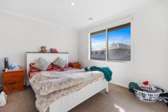  11 Dusty Drive Point Cook VIC 3030 $820,000-$890,000 Make your family's life easier with this thoughtfully designed home, offering functional spaces and low-maintenance features that create the perfect environment for you and your loved ones. Upstairs, you'll find four large bedrooms, including the primary bedroom featuring a spacious walk-in robe, a private balcony and an ensuite. The remaining three bedrooms are equipped with built-in robes and share a beautifully appointed central bathroom. Downstairs, a versatile fifth bedroom can effortlessly transform into a home office, playroom or anything you like. The heart of the home is the open-concept living, dining and kitchen area that seamlessly extends to a spacious, fully fenced backyard. The living area includes easy access to a powder room for guests. Upstairs, a cosy family retreat awaits, perfect for snuggling with loved ones on quiet evenings. The well-equipped laundry space boasts ample linen storage and a direct door to the clothesline outside, while the double garage with internal access ensures effortless transitions from car to home. Your family's dream awaits - schedule a viewing today! 