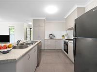  12 Village Circuit EIMEO QLD 4740 Welcome to 12 Village Circuit, Eimeo, where convenience meets comfort. This stunning 4-bedroom, 2-bathroom home is perfectly positioned on a corner lot, surrounded by huge trees that provide ample shade and a serene atmosphere. Enjoy easy access to the Eimeo Pub, beautiful beaches, and convenient grocery shops, making this the perfect place to call home. Step inside to find a spacious and modern open-plan layout designed for comfortable living. All four bedrooms are generously sized, featuring built-in robes. Air-conditioned to ensure year-round comfort. The master bedroom is a true retreat, complete with an ensuite for privacy. The second well-appointed bathroom caters to the needs of the entire household. The heart of the home is the functional kitchen, equipped with a built-in oven and electric cooktop, perfect for cooking up family meals or entertaining friends. The open-plan living area is expansive, providing a versatile space for relaxation and gatherings. You'll love the outdoor entertaining area, an ideal spot for alfresco dining or simply enjoying the Queensland weather. The simple, low-maintenance gardens offer a bit of greenery without the hassle, and the fully fenced yard ensures a safe space for pets to roam freely. This home is not only generous in layout but also in simplicity, offering a low-maintenance lifestyle with all the modern conveniences. Don't miss this opportunity to experience the perfect blend of comfort and convenience. 