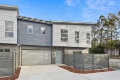  10/18 Phillips Avenue West Wollongong NSW 2500 $895,000 Embrace a carefree, suburban lifestyle with these meticulously crafted town homes located in the heart of Wollongong. A great place to put down roots, each offering three well-proportioned bedrooms including a spacious main with walk-in wardrobe, a tastefully-designed kitchen with stone benchtops, lock-up garage and a peaceful courtyard, where you can enjoy a morning cuppa or simply take a well-deserved time out from the hustle and bustle of the day. Providing a neutral canvas for you to make the space your own, this light-filled residence offers families of all ages and stages the opportunity to be the first to call this delightful town house a home. Features • High ceilings throughout main living areas • Ducted reverse-cycle A/C upstairs and down • two bathrooms, 1 downstairs and 1 upstairs • Large bedrooms with built in robes • Second sitting room upstairs, under stair storage • Situated in a lush cul-de-sac, moments to the CBD 
