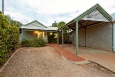  34A Glenister Loop Cable Beach WA 6726 $515,000 Whether you're looking for the perfect downsizer, low-maintenance beachside living, or the ultimate lock and leave lifestyle, this is the property for you! Tucked away in a popular Cable Beach location, this neat and tidy 3x1 duplex offers a flexible floorplan with a host of options for owners at all stages of life. Surrounded by beautiful, lush tropical gardens and boasting an impressive list of features, this property is sure to attract plenty of attention. Let's take a look at what makes this duplex so desirable. There's an undercover carport with space for one vehicle, with additional space for a car, boat or trailer alongside. Light and bright, the fully-tiled interior boasts large split living and dining rooms which flow into the spacious kitchen with built-in corner pantry, large fridge recess, tiled splashbacks and an abundance of bench and cupboard space. Other keys features include the big main bathroom with separate shower and bath, the separate laundry with a second toilet and built-in linen cupboard, air-conditioning, ceiling fans, security screens to windows and more! The duplex boasts 3 large carpeted bedrooms, both with built-in robes, including the spacious Master complete with dual built-in robes. Seamlessly blending indoor/outdoor living, the rear paved alfresco area with pergola is perfect for entertaining overlooking a large grassed area and surrounded by lush tropical gardens. The large attached shed adds a real element of flexibility to the property with the ability for owners to use it for a variety of purposes, including a studio, workshop, or even converted to another living space or granny flat. Located close to parks, schools, TAFE, the Boulevard Shopping Centre and just a short distance from the golden sands of Cable Beach, the best of Broome is just a short walk from your door. 