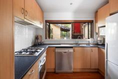  45 Jasper Terrace Frankston South VIC 3199 $910,000 - $1,000,000 Exuding an abundance of period character and enduring charm, this c1920s Miners Cottage showcases exquisitely refurbished single-level space that promises an exceptional family lifestyle with effortless indoor-outdoor fluidity. Beautifully enhanced with today's comfort, this FHSZ address presents easy walking to Frankston Foreshore, George Pentland Botanic Gardens and Overport Primary School. Framed by attractive manicured gardens and a distinguished facade, the home's interior opens gracefully across solid hardwood timber floors to reveal a light-filled entertaining footprint comprising a dedicated lounge with wood fire, open dining area and modern kitchen with quality appliances and bi-fold servery window opening to the rear. With the crackle of an open fireplace setting a relaxed ambience for outdoor enjoyment, the expansive deck alfresco with soaring pitched roofline invites indulgent hosting capabilities amongst private palm-filled surrounds. The main house offers comfortable accommodation with two robed-bedrooms and a main bathroom, while a rear studio presents a private space for guests, young adult children or a private working-from-home space, if desired. Featuring split-system heating and cooling, established gardens, bird aviary, a rear powered shed, and double carport with additional space for off-street parking, this premium beachside home provides the ultimate combination of comfort, convenience and luxury for a tranquil coastal lifestyle. 
