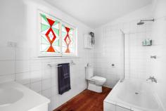  45 Jasper Terrace Frankston South VIC 3199 $910,000 - $1,000,000 Exuding an abundance of period character and enduring charm, this c1920s Miners Cottage showcases exquisitely refurbished single-level space that promises an exceptional family lifestyle with effortless indoor-outdoor fluidity. Beautifully enhanced with today's comfort, this FHSZ address presents easy walking to Frankston Foreshore, George Pentland Botanic Gardens and Overport Primary School. Framed by attractive manicured gardens and a distinguished facade, the home's interior opens gracefully across solid hardwood timber floors to reveal a light-filled entertaining footprint comprising a dedicated lounge with wood fire, open dining area and modern kitchen with quality appliances and bi-fold servery window opening to the rear. With the crackle of an open fireplace setting a relaxed ambience for outdoor enjoyment, the expansive deck alfresco with soaring pitched roofline invites indulgent hosting capabilities amongst private palm-filled surrounds. The main house offers comfortable accommodation with two robed-bedrooms and a main bathroom, while a rear studio presents a private space for guests, young adult children or a private working-from-home space, if desired. Featuring split-system heating and cooling, established gardens, bird aviary, a rear powered shed, and double carport with additional space for off-street parking, this premium beachside home provides the ultimate combination of comfort, convenience and luxury for a tranquil coastal lifestyle. 