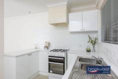  36B Stuart St Koongamia WA 6056 $449,000 Prepare to have your head turned and heartstrings plucked by this bright, uncomplicated property. Set beside the much-loved Heritage Trail and boasting a large, private backyard, this impeccably presented home is an excellent entry point to the property market, a wonderful downsizer and an unparalleled first home. 2 bedrooms 1 bathroom 1984-built brick and tile Open-plan kitchen & living Fresh light colour palette Split AC & gas bayonet Drive-through side access No-fees strata property Big fully fenced backyard 520 sqm level block Trail-side location A well-tended front garden planted with roses and lavender sets this home back from the road, and a driveway along one boundary leads through a gate to the fully fenced backyard. The garden surrounding the house is a surprise and a delight, offering outdoor living and entertaining in a fantastic setting, adjacent to the bridle trail.  This property’s appeal grows as you step from the welcoming front porch into an open-plan kitchen, lounge and meals area. Good proportions, a fresh neutral colour palette and loads of natural light fashion an instantly welcoming sense of home. Dual-aspect glazing and a flowing floorplan heighten the sense of space and create a seamless link to the large backyard. The lounge sits at the front of the plan, with views of the front garden and modern sculpture lining the path of the Heritage Trail. Carpet and a gas bayonet add to a sense of comfort in the lounge, while the meals and kitchen have vinyl flooring. The kitchen has been updated and is a simple and practical space with glossy white cabinetry and tiled splashback, a freestanding oven, and a built-in pantry. A door from the kitchen leads to the small rear patio and generous backyard featuring a level lawn edged with garden beds, established trees, and a garden shed. One side of the plan has bedrooms arranged to the front and rear, with the main at the front featuring reverse-cycle air conditioning and a freestanding robe. The family bathroom and walk-through laundry with a separate WC sit between the two bedrooms off a hallway with a large linen press. Garden views bring a pastoral charm to the rear bedroom. Koongamia offers a magical mixture of foothills adventure and city convenience. This truly impressive and charming property combines easy access to Midland and beyond, hours of walking and riding along the Heritage Trail, and the convenience of nearby private and state schools. Surrounding streets are lined with lovingly renovated and renewed homes in an interesting and exciting neighbourhood experiencing a renaissance. 