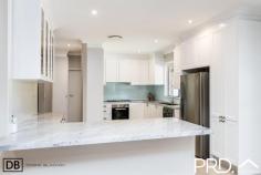  36 Blair Avenue East Hills NSW 2213 This stunning, modern entertainer ticks all the boxes and sets a new standard for family living. Boasting a long list of must have items, you will ultimately fall in love from the time you walk through the door. Property Flyover: - Brick construction. - Great 607sqm block. - Large open plan lounge and dining. - Amazing designer kitchen with gas cooking and 50mm marble bench tops - Three great sized bedrooms complete with built-in-robes - Ducted air conditioning throughout. - A bonus 2nd bathroom / laundry. - Lock up garage with carport + plenty of room for a camper van or boat - Stunning outdoor entertaining area perfect for weekend bbq's with family and friends 