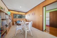  11C/3 Davies Place Torrens ACT 2607 $650,000 Tucked away in a quiet complex of 12 in the coveted suburb of Torrens, this distinctive 2-bedroom, 2-storey townhouse blends post-modern architectural elegance with retro 1970s vibes. Step into the kitchen and you're greeted by the vibrant walls and leafy outlook complementing the wooden cupboards. The kitchen's charm flows into the spacious dining and living area which are versatile spaces ready for your daily meals, grand dinner parties or curling up on the couch with a book. Whether you're home from work or school, the study nook is the perfect spot to get your work done. The living area offers a space which fills with natural light through the wide glass doors that open to the spacious patio. This paved oasis, framed by established trees for privacy, is perfect for entertaining friends or enjoying a quiet moment by yourself in the sun. Downstairs, all bedrooms have built-in robes and copious sunlight through the large windows that look across the garden. Also downstairs, the main bathroom features a full bath and tiling that echoes the home's unique character. This charming home is perfect for young families or downsizers alike. Located in a peaceful neighbourhood, walkable to the local shops and public transport, it offers the rare combination of quiet and convenience. The property's proximity to local schools and nature trails make it clear why Torrens is such a sought after suburb. This classic Canberra home is the perfect combination of "nothing more to do" and "so much potential". Whichever way you go, this townhouse will immediately feel like home. Your new home features: Architect designed by Dirk Bolt Central living area opens out to sunny north facing paved terrace Dual level layout separates living and accommodation zones Charming kitchen with treetop views All bedrooms have built in robes Main bathroom with separate bath/shower Reverse cycle split heating and cooling system in living room Separate laundry Storage nook underneath stairway and linen press by the bathroom Single carport with direct access to property and ample visitor parking Sunny outdoor terrace with treetop views and storage room Wonderful neighbours/community - a mix of younger families and long-term residents Quiet complex surrounded by trees Close to Mt Taylor's walking trail, Torrens shops, Torrens early learning and primary school, Southlands Shopping Centre, Marist College, Woden Westfield and Canberra Hospital. Quick walk to Athllon drive for bus connections to Tuggeranong, Woden, Civic, ANU and Belconnen. 