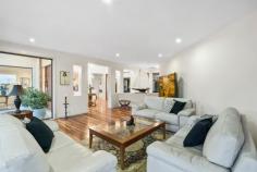  75 Bankers Road Bywong NSW 2621 Exquisitely designed and positioned to capture the northern sun, this grand family abode beckons those in search of perfection. With a secluded location, the expansive residence is ideal for large families, car enthusiasts (9 car garage!) or those seeking versatile living arrangements for extended family. Either way, 75 Bankers Road makes a powerful statement in style and sophistication with a heavy emphasis placed on indoor and outdoor entertaining and resort-style living. From the moment you step through the front door, your eyes are draw to the picturesque backdrop of the sparkling in-ground swimming pool and verdant grounds. A clever design encompasses formal and informal living areas, separate tv room and music/rumpus room, library and study. For the chef in the family there is the show stopping fully equipped entertainer's kitchen, complete with integrated Miele appliances and walk-in butler's pantry. It is the perfect place to cook up a storm and still be connected to family and friends. A segregated parent's retreat boasts a walk through robe, indulgent ensuite complete with spa bath and a private elevated terrace, the perfect spot to end the day. The secondary bedrooms offer a flexibility that is rarely found with a guest bedroom featuring its own ensuite, built-in robes to all rooms and the office/5th bedroom also with its own walk-in robe and ensuite access to a bathroom. Surrounded by beautifully landscaped gardens, you will find a prolific fruit tree orchard, vegetables gardens and manicured lawns spread across 1.18ha. Located in Hideaway Estate, you have exclusive access to an additional 37.12ha of community land, ideal for exploring on foot to find that perfect picnic spot, birdwatch or be one with the natural bush. Situated just over 18 minutes to Dickson, 7 minutes to Sutton Village and 14 minutes to Bungendore the commute is short. School buses depart from the entry to Bankers Road to Canberra's major schools, and Coles and Woolies home deliver giving you all the benefits of rural living without compromise. 75 Bankers Road is an outstanding example of rural living at its best with all of the hard work done. North facing solar passive home Expansive family residence on 1.18ha In slab electric heating to parents retreat and kitchen and family room Reverse cycle air-conditioning throughout Slow combustion fireplace in family room Double glazed argon filled windows Porcelain tiles in living area, spotted gum timber floors in entry and formal lounge dining An abundance of storage throughout Ducted vacuum Mudroom entries from garages Under house wine cellar 18m x 4m tiled lap pool with 2 separate lanes 20KW solar panels on roof 3 phase power Alarm system 100,000L water tank Bore water connected to garden taps 2 bore water community water tanks Manicured gardens around residence Orchard and vegetable gardens Formal gated entry to property - with beautifully designed Corten inserts Council Rates: $1,648pa (approx.) Community Fees: $1,800pa (approx.) 