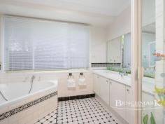  4 Glanara Ct Wattle Grove NSW 2173 Discover your dream home in the heart of Wattle Grove! This beautifully appointed four-bedroom family residence is located on a highly desirable and convenient street, perfect for family living. Situated on a spacious corner block, this home offers easy access to Wattle Grove Plaza, local schools, lakeside, and parks. Features: - Four Spacious Bedrooms: All bedrooms come with built-in wardrobes. - Two Master Suites, including private ensuites. - Living Spaces: Enjoy a bright formal lounge and a separate study/bar area. - Modern Kitchen: Features stone bench tops, gas appliances, and ample cupboard space. - Light-Filled Rumpus: Equipped with split-system air-conditioning. - Quality Features: Includes timber flooring, alarm system, freshly paintwork, solar panels, ducted air conditioning. - Outdoor Entertaining: Large timber decked alfresco area overlooking a semi-in-ground pool. - Parking & Storage: Large double garage with workshop space and side access to a generous yard area. Can park a trailer, van or another vehicle. Don't miss out on this rare opportunity to own a family home that combines style, space, and convenience in one of Wattle Grove's most sought-after streets. 