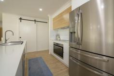  9 Denaid Court Benaraby QLD 4680 $1,200,000 NEARLY NEW: This low-set brick home was built just over three years ago, perfectly designed for modern family living, with a neutral colour scheme throughout, high ceilings, quality fixtures and fittings, sitting proud on a sprawling 8,614m2 which is over two acres. There is an impressive 20m x 9m shed with 4 large roller doors, a double size lean- to carport which is 6m x 9m for additional covered parking. Plus, the shed is equipped with both 10- and 15-amp outlets, a mezzanine floor, a car hoist and there's even a separate shower and toilet block adjacent to the carport for added convenience! Immaculate in every way, inside and outside, and this is what makes this home truly exceptional. Home Features: The kitchen has a 900mm Induction cooktop, Island bench, double sink, dishwasher, walk-in pantry with a coffee station, plus plenty of bench space, and ample soft closing cupboards and drawers. The living, dining and kitchen area is a spacious open plan design with glass louvres to provide stunning views from every angle, and gentle breezes to flow through all year round. Large glass sliding doors open to an expansive undercover area, and seamlessly bring the indoor and outdoor entertaining spaces together, making it just perfect for hosting gatherings or enjoying a quiet evening outdoors. The media room is an ideal retreat for family movie nights, or it can be transformed into a playroom for the kids, plus there is a dedicated separate study nook. The Master bedroom is air conditioned and a super king size room, with an ensuite tiled to the ceiling, double vanity, walk-in shower, and a walk-in robe. There are another three bedrooms, one of them is a king size room, all have built-in robes, air conditioning, while the main bathroom is also tiled to the ceiling and has a separate bath and shower, vanity and a separate toilet. This is an impressive home without doubt, with beautifully manicured gardens and lawns, and a fully fenced separate house yard. An entertaining area thoughtfully designed with concrete bench tops, a place for a pizza oven, seating, a fire pit and lighting, making it a fantastic spot for family and friends to gather!! This property lends itself to those who perhaps want to run a business from home with the extensive shed space, ideal if you have trucks, trailers, extra vehicles or machinery etc, however you may just want to store a caravan, the boat, camping and fishing gear! This gorgeous home offers the perfect combination for families seeking extra space on acreage, modern comforts, and a clean fresh 'Country Lifestyle'. WHY WAIT TO BUILD, WHEN IT'S ALREADY DONE?? Conveniently located only a 15-minute drive to the Gladstone CBD, Tannum Sands Beach and the Boyne River 