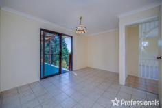  18 Magnetic Drive Tamborine Mountain QLD 4272 $1,050,000 Perched proudly on the hill, this solid home offers impressive views of the Gold Coast and the ocean beyond from the main living areas and the sunny north-facing covered deck. Built in the 1980s, this two-storey brick home exudes durability and charm, reflecting the era when homes were built to last. Although it may need some updating, it remains comfortable and well-maintained, making it an excellent investment opportunity or enjoy as your family home. The home features a bright and airy interior, with abundant windows throughout to capture the breeze. Upon entering through the formal entrance hall via the front veranda, you are greeted by a formal lounge and dining room with views of the coast. The practical kitchen, equipped with electric cooking, offers south-facing views from the window, and the adjacent family dining area opens to the BBQ deck. External door and ramp to the back garden adds convenience. Downstairs, a self-contained living space offers additional flexibility with a bedroom, lounge, kitchenette, and bathroom. This area is ideal for extended family, guests, or potential rental income. Additionally, a “mancave” workshop or dry storage space provides extra room for hobbies or storage needs. Main level: – 3 bedrooms – Family bathroom – Laundry – Separate living room – Dining room – Kitchen – Front and rear deck Downstairs: – 1 bedroom – Family room – Kitchenette – Bathroom Underneath: – Workshop/man cave, dry storage Outside: – Carport – Flat 1,012m2 block – 8 solar panels The very neat mature gardens offer ample space for children to play or for growing vegetables. With two driveways, one leading to the granny flat and one to the upstairs level, and a single carport with room for a garage if desired, this home combines practicality with potential. 