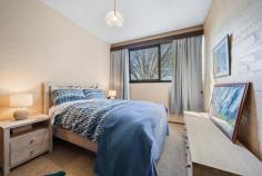  11C/3 Davies Place Torrens ACT 2607 $650,000 Tucked away in a quiet complex of 12 in the coveted suburb of Torrens, this distinctive 2-bedroom, 2-storey townhouse blends post-modern architectural elegance with retro 1970s vibes. Step into the kitchen and you're greeted by the vibrant walls and leafy outlook complementing the wooden cupboards. The kitchen's charm flows into the spacious dining and living area which are versatile spaces ready for your daily meals, grand dinner parties or curling up on the couch with a book. Whether you're home from work or school, the study nook is the perfect spot to get your work done. The living area offers a space which fills with natural light through the wide glass doors that open to the spacious patio. This paved oasis, framed by established trees for privacy, is perfect for entertaining friends or enjoying a quiet moment by yourself in the sun. Downstairs, all bedrooms have built-in robes and copious sunlight through the large windows that look across the garden. Also downstairs, the main bathroom features a full bath and tiling that echoes the home's unique character. This charming home is perfect for young families or downsizers alike. Located in a peaceful neighbourhood, walkable to the local shops and public transport, it offers the rare combination of quiet and convenience. The property's proximity to local schools and nature trails make it clear why Torrens is such a sought after suburb. This classic Canberra home is the perfect combination of "nothing more to do" and "so much potential". Whichever way you go, this townhouse will immediately feel like home. Your new home features: Architect designed by Dirk Bolt Central living area opens out to sunny north facing paved terrace Dual level layout separates living and accommodation zones Charming kitchen with treetop views All bedrooms have built in robes Main bathroom with separate bath/shower Reverse cycle split heating and cooling system in living room Separate laundry Storage nook underneath stairway and linen press by the bathroom Single carport with direct access to property and ample visitor parking Sunny outdoor terrace with treetop views and storage room Wonderful neighbours/community - a mix of younger families and long-term residents Quiet complex surrounded by trees Close to Mt Taylor's walking trail, Torrens shops, Torrens early learning and primary school, Southlands Shopping Centre, Marist College, Woden Westfield and Canberra Hospital. Quick walk to Athllon drive for bus connections to Tuggeranong, Woden, Civic, ANU and Belconnen. 