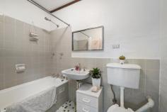  11C/3 Davies Place Torrens ACT 2607 $650,000 Tucked away in a quiet complex of 12 in the coveted suburb of Torrens, this distinctive 2-bedroom, 2-storey townhouse blends post-modern architectural elegance with retro 1970s vibes. Step into the kitchen and you're greeted by the vibrant walls and leafy outlook complementing the wooden cupboards. The kitchen's charm flows into the spacious dining and living area which are versatile spaces ready for your daily meals, grand dinner parties or curling up on the couch with a book. Whether you're home from work or school, the study nook is the perfect spot to get your work done. The living area offers a space which fills with natural light through the wide glass doors that open to the spacious patio. This paved oasis, framed by established trees for privacy, is perfect for entertaining friends or enjoying a quiet moment by yourself in the sun. Downstairs, all bedrooms have built-in robes and copious sunlight through the large windows that look across the garden. Also downstairs, the main bathroom features a full bath and tiling that echoes the home's unique character. This charming home is perfect for young families or downsizers alike. Located in a peaceful neighbourhood, walkable to the local shops and public transport, it offers the rare combination of quiet and convenience. The property's proximity to local schools and nature trails make it clear why Torrens is such a sought after suburb. This classic Canberra home is the perfect combination of "nothing more to do" and "so much potential". Whichever way you go, this townhouse will immediately feel like home. Your new home features: Architect designed by Dirk Bolt Central living area opens out to sunny north facing paved terrace Dual level layout separates living and accommodation zones Charming kitchen with treetop views All bedrooms have built in robes Main bathroom with separate bath/shower Reverse cycle split heating and cooling system in living room Separate laundry Storage nook underneath stairway and linen press by the bathroom Single carport with direct access to property and ample visitor parking Sunny outdoor terrace with treetop views and storage room Wonderful neighbours/community - a mix of younger families and long-term residents Quiet complex surrounded by trees Close to Mt Taylor's walking trail, Torrens shops, Torrens early learning and primary school, Southlands Shopping Centre, Marist College, Woden Westfield and Canberra Hospital. Quick walk to Athllon drive for bus connections to Tuggeranong, Woden, Civic, ANU and Belconnen. 