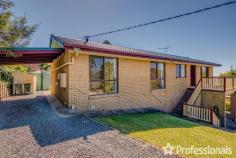  18 Magnetic Drive Tamborine Mountain QLD 4272 $1,050,000 Perched proudly on the hill, this solid home offers impressive views of the Gold Coast and the ocean beyond from the main living areas and the sunny north-facing covered deck. Built in the 1980s, this two-storey brick home exudes durability and charm, reflecting the era when homes were built to last. Although it may need some updating, it remains comfortable and well-maintained, making it an excellent investment opportunity or enjoy as your family home. The home features a bright and airy interior, with abundant windows throughout to capture the breeze. Upon entering through the formal entrance hall via the front veranda, you are greeted by a formal lounge and dining room with views of the coast. The practical kitchen, equipped with electric cooking, offers south-facing views from the window, and the adjacent family dining area opens to the BBQ deck. External door and ramp to the back garden adds convenience. Downstairs, a self-contained living space offers additional flexibility with a bedroom, lounge, kitchenette, and bathroom. This area is ideal for extended family, guests, or potential rental income. Additionally, a “mancave” workshop or dry storage space provides extra room for hobbies or storage needs. Main level: – 3 bedrooms – Family bathroom – Laundry – Separate living room – Dining room – Kitchen – Front and rear deck Downstairs: – 1 bedroom – Family room – Kitchenette – Bathroom Underneath: – Workshop/man cave, dry storage Outside: – Carport – Flat 1,012m2 block – 8 solar panels The very neat mature gardens offer ample space for children to play or for growing vegetables. With two driveways, one leading to the granny flat and one to the upstairs level, and a single carport with room for a garage if desired, this home combines practicality with potential. 