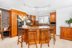  186 North Kiama Drive Kiama Downs NSW 2533 $1,680,000 - $1,750,000 Positioned in the beachside pocket of Kiama Downs with an enviable lifestyle on offer, this meticulously loved and highly cared for home delivers an outstanding family sanctuary only moments from the ocean. Having been constructed by well-renowned local builder Ian Kilmore and Sons, the home has withstood the test of time with quality finish and expert craftsmanship. Built with comfort in mind, the home offers multiple areas to unwind or host friends and family, spanning the media room, rumpus room, to the free flowing dining area and large undercover alfresco. Accommodation includes three bedrooms all of which feature ducted air conditioning and plantation shutters, while the master suite which hosts the same luxuries also offers a private balcony, walk-in wardrobe and an ensuite. Further features to highlight include: A generously appointed kitchen with modern appliances, Tasmanian oak cabinetry, solid granite benches, along with plenty of bench space for both the novice and experienced cook. A generous two-car garage as well as a concrete pad for the caravans, boats and other toys. A large saltwater concrete pool, conveniently located to capture the north/east aspect Featuring a split-level house design, the house offers secluded areas without interrupting the flow of the home Multi-zoned ducted air-conditioning throughout the property Being a level 300m walk from your front door, Jones Beach is almost in your backyard, on your way home after a swim, take a short detour to the Johnson Street shopping strip which features local cafes, a grocer, pharmacist, gym, bottleshop and more. This location offers an amazing locale for those looking to holiday, invest or simply raise a family in a superb coastal position. 