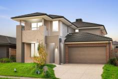  11 Dusty Drive Point Cook VIC 3030 $820,000-$890,000 Make your family's life easier with this thoughtfully designed home, offering functional spaces and low-maintenance features that create the perfect environment for you and your loved ones. Upstairs, you'll find four large bedrooms, including the primary bedroom featuring a spacious walk-in robe, a private balcony and an ensuite. The remaining three bedrooms are equipped with built-in robes and share a beautifully appointed central bathroom. Downstairs, a versatile fifth bedroom can effortlessly transform into a home office, playroom or anything you like. The heart of the home is the open-concept living, dining and kitchen area that seamlessly extends to a spacious, fully fenced backyard. The living area includes easy access to a powder room for guests. Upstairs, a cosy family retreat awaits, perfect for snuggling with loved ones on quiet evenings. The well-equipped laundry space boasts ample linen storage and a direct door to the clothesline outside, while the double garage with internal access ensures effortless transitions from car to home. Your family's dream awaits - schedule a viewing today! 