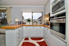  8A Portsea Pl Cooloongup WA 6168 $569,000 This charming 3-bedroom, 1-bathroom free-standing home, nestled at the end of a tranquil cul-de-sac, offers both comfort and convenience. Boasting tiled flooring throughout and a recently renovated semi-ensuite bathroom, this well-maintained residence features modern stainless steel appliances that enhance its kitchen. The good-sized backyard, featuring established trees and gardens, provides an ideal space for relaxation and outdoor activities. Located in the prestigious Woodbridge Golf Course Estate, this home offers proximity to schools, shops, medical centres, Hospital, Rockingham Golf Course, Train Station, University, TAFE, our beautiful coastline, and many family-friendly beaches, ensuring all your daily needs are met with ease. Embrace a lifestyle of serenity and accessibility in this delightful, low-maintenance property. Ideally suited to young families, retirees, students, astute investors, hospital staff, Navy and FIFO personnel. Features Include: • Reverse cycle split system air conditioning • Separate living areas include a front formal lounge and an open-plan family and dining room • Kitchen fitted with stainless steel appliances and overhead cabinetry • Master bedroom offers a split system, ceiling fan, walk-in robe, and direct access to the bathroom • Easy-clean tiled flooring throughout the home • Renovated semi-ensuite bathroom with separate bath and shower • Automatic bore reticulation to save on your water bills • Lovely landscaped backyard with garden shed, established trees and garden beds • Patio and a gazebo for outdoor entertaining • A second patio extends from the carport to fit 2 cars parked in tandem • No common walls, zero strata fees, and separate insurance • 557sqm block of land with 110sqm of spacious internal living area Don't let this great value home slip through your fingers, act now! 
