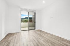  201/12 Harbinger Street Corrimal NSW 2518 $850,000 Stunning near new light filled 2nd floor apartment set in the Village complex perfectly positioned between the mountains and sea within 100m to shops and transport . Comprising open plan kitchen and living, stone benchtops, quality gas appliances , media/study room, main bathroom with freestanding bath,2 bedrooms with BIW's and ensuite to main. Aircon throughout and separate laundry. Ample balcony with escarpment views . Two parking spaces in undercover security garage with storage cage. Well maintained central gardens and communal spaces and full security access. 