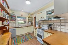  46 Railway Avenue Austinmer NSW 2515 It's all about the potential!!! This original 3 bedroom cottage is positioned on a generous 974m block in a fantastic location, only a short walk from the heart of Austinmer. It's the perfect opportunity to renovate the existing house or start from scratch to create your dream coastal home. YOUR HOME • Despite needing some love and attention, the current house is teeming with vintage character. If you appreciate the charm of yesteryear combined with the conveniences of modern living, this could be the perfect renovator for you. • The large backyard is the perfect space for entertaining friends and family. Enjoy an alfresco meal on the patio while the kids play in the yard, before retiring to the newly built deck at the rear of the property to enjoy a glass of wine while taking in the beautiful views. • Featuring a single lock-up garage with remote door. • A gas fireplace keeps you warm through the winter months and provides a great ambience. • On the lower level of the home, there is plenty of storage along with an additional rumpus room. • Blocks of residential land this size are becoming harder and harder to find. Zoned R2 low density residential with a 15m+ frontage. • Boasts glimpses of the ocean and surrounding bushland, which would be greatly improved by adding a 2nd story (STCA). • Property is situated directly opposite bushland and surrounded by a bush setting, providing you with peace, privacy and tranquility. YOUR LOCATION • This is a highly sought after location, at the end of a quiet cul-de-sac, surrounded by native flora, and only a short walk to the popular beaches, parks, shops, cafes and school. • Embrace that relaxed coastal lifestyle with swimming, fishing, surfing, hiking and sunrise/sunset walks on the beach all available only moments from your doorstep. • The local beach is patrolled and also boasts an ocean pool + great surf break. • Both the train station and bus stop are situated within easy walking distance. • There is also a little-known park just at the end of the street, only seconds from your front door. Perfect for those who like to spend time outdoors without being surrounded by people. • This is one of the most desirable suburbs on this pristine coastline. It is the perfect coastal retreat approximately 1 hour South of Sydney CBD and approximately 30 minutes North of Wollongong CBD. • Austinmer offers a community-based coastal lifestyle with an easy access to Sydney and Wollongong and all that the Northern Illawarra has to offer. 