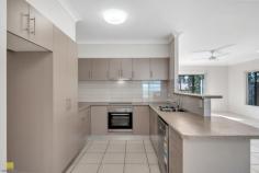  10 Norfolk Circuit Redlynch QLD 4870 $699,000 Your house hunting stops here …. Welcome to 10 Norfolk Circuit, Redlynch Therese Plath says "If you are looking for a private home that is loaded with features to move in ready, then look no further as this home will be sure to meet your requirement". This immaculately presented, low maintenance home is located in the highly sought after area of Redlynch, Cairns so close to all amenities including Redlynch Centre Shopping Centre, state and private schools and sporting nearby and approximately 12kms to Cairns City Centre. Nestled on a tranquil street, this single-level home sits on a gently elevated lot. Step inside to discover a welcoming atmosphere, accentuated by numerous windows that infuse the space with light and airiness, complemented by neutral tones. The generous, tropical open-plan design seamlessly expands the main living area through glass sliding doors, which open onto the spacious polished concrete alfresco dining and entertaining patio overlooking the fenced, safe backyard with a wonderful mountainous view. The functional kitchen is the hub of the home with breakfast bar, ceramic cook top and oven, new dishwasher, overhead cupboards, pantry and plenty of bench space. The master bedroom positioned for privacy at the rear of the home features a large walk in robe and en-suite which includes shower, single vanity and toilet, whilst the other three bedrooms with built in robes share the main bathroom with bath, shower and single vanity. Easy care gardening, this blank canvas awaits. Double gates allow easy access to the rear of the yard with ample space for swimming pool or shed and a safe haven for children and pets to play. Additional features include: Fully tiled throughout Fully air-conditioned and ceiling fans throughout Security screened to complete Vertical blinds Internal laundry Large linen cupboard Remote double garage with internal access Fenced at sides and rear with single and double gate side access to the front Approximate rental $ 700.00 to $730.00 per week, this home represents a prime opportunity for savvy investors or discerning homeowners 