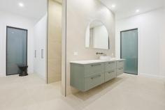  38 Cooke Street Nichols Point VIC 3501 $1,050,000 - $1,150,000 Superbly designed and masterfully crafted is this grand residence, filled with quality and luxurious style that is sure to be the envy of all others. From your first foot in the door past a commanding facade, you have so many features to soak in. Large double glazed windows allow natural light to comfortably fill the heart of the home and bring out the calming tone of your polished concrete floors that perfectly blend with modern, chic cabinetry. You can tell that every aspect of this build has been thoroughly thought through, with every detail big and small considered. A rare offering to the market, where it is clear that every selection in the home can be classed as a real feature in its own right. Your master suite through a double door entry boasts an abundance of cabinetry and space to move around with an 'oversized' vanity, walk-in shower and additional bench space, making getting ready a breeze. Your chef worthy kitchen contains high end fixtures & fittings, classy stone and a full sized butlers pantry with automatic, sensor lighting. The inclusion of an additional lounge space that can flow seamlessly to your main living zone, or alternately be closed off for a more formal setting showcases the versatility this home offers. Gorgeous sheer curtains give a very private feel, however privacy is not something that doesn't come naturally with living in this tightly held location. Bedrooms two, three & four all offer plenty of space and are well serviced by a separate powder room and stunning bathroom with large feature tiles. If entertaining outdoors is your style, the home's incredible vaulted ceilings flow through to your covered alfresco space, where sitting and taking in the manicured half acre allotment is relaxing be it morning or afternoon. Side access is included through to storage shedding and an additional, fully self contained bungalow that makes living and entertaining here even more seamless. This home impresses from top to toe and upon inspection you will not be disappointed, sure to be the envy of others in style, quality, location & more! 