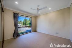  18 Magnetic Drive Tamborine Mountain QLD 4272 $1,050,000 Perched proudly on the hill, this solid home offers impressive views of the Gold Coast and the ocean beyond from the main living areas and the sunny north-facing covered deck. Built in the 1980s, this two-storey brick home exudes durability and charm, reflecting the era when homes were built to last. Although it may need some updating, it remains comfortable and well-maintained, making it an excellent investment opportunity or enjoy as your family home. The home features a bright and airy interior, with abundant windows throughout to capture the breeze. Upon entering through the formal entrance hall via the front veranda, you are greeted by a formal lounge and dining room with views of the coast. The practical kitchen, equipped with electric cooking, offers south-facing views from the window, and the adjacent family dining area opens to the BBQ deck. External door and ramp to the back garden adds convenience. Downstairs, a self-contained living space offers additional flexibility with a bedroom, lounge, kitchenette, and bathroom. This area is ideal for extended family, guests, or potential rental income. Additionally, a “mancave” workshop or dry storage space provides extra room for hobbies or storage needs. Main level: – 3 bedrooms – Family bathroom – Laundry – Separate living room – Dining room – Kitchen – Front and rear deck Downstairs: – 1 bedroom – Family room – Kitchenette – Bathroom Underneath: – Workshop/man cave, dry storage Outside: – Carport – Flat 1,012m2 block – 8 solar panels The very neat mature gardens offer ample space for children to play or for growing vegetables. With two driveways, one leading to the granny flat and one to the upstairs level, and a single carport with room for a garage if desired, this home combines practicality with potential. 