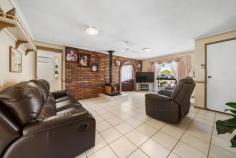  25 Graman Street Kingsthorpe QLD 4400 $629,000 Sitting in the heart of Kingsthorpe this family, low-set brick home, offers style and functionality perfect for you and your family. From entry you will notice the warmth and comfort oozing from each section of the home. Main lounge room features cosy wood heating and ceiling fan. Tiled family room has ultimate space and comfort for the growing family. Fresh modern timber kitchen offers loads of bench in cupboard space with all brand new appliances, including new range hood, dishwasher, electric cooktop and oven. Reverse cycle air conditioning is perfectly positioned in the dining room for all year-round comfort. Three generous built-in bedrooms all have ceiling fans with two rooms featuring reverse cycle air conditioning for your comfort and convenience. Modern bathroom is large in size offers huge shower, vanity and floor to ceiling wall titles. Entertain family and friends under the large timber pergola area that overlooks the spacious flat rear yard. Tying in with the brick veneer look of the home, the bricked 6x9m powered garage with remote roller door plus attached single carport is ideal. Beat rising energy costs with 16 solar panel solar system, brand new hot water system plus a 22,500lt litre rainwater tank plumbed to the whole house for your convenience. This family home sits on a massive 2,253m2 block and is in close proximity to parkes, school, childcare, IGA, dentist, pathology and pharmacy. The first to see this cracking family home, will buy! 