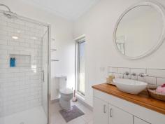  18 Hall Rd Foster VIC 3960 $495,000 Set on approx. 999m2, enjoying a peaceful outlook over the trees and access to the Whipstick Gully reserve for bush walking and mountain biking, yet only a few minutes from the centre of town. With some renovations undertaken already, this is the perfect opportunity to complete the dream. Country style kitchen with stylish 900mm dual fuel range set into the original hearth, timber benchtops and breakfast bar to a light filled meals area. Cosy living room with combustion heater in brick hearth and doors opening out to a private deck. Three bedrooms (one with the romance of a fireplace), master with a sparkling new ensuite bathroom. Main bathroom plus laundry / utility room with separate w.c. Corner block with access to a LU garage / workshop and parking for additional cars, caravans or boats. If you are looking for a country feel with in-town convenience, this property is sure to appeal. 
