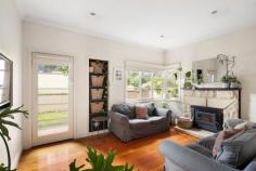  45 Jasper Terrace Frankston South VIC 3199 $910,000 - $1,000,000 Exuding an abundance of period character and enduring charm, this c1920s Miners Cottage showcases exquisitely refurbished single-level space that promises an exceptional family lifestyle with effortless indoor-outdoor fluidity. Beautifully enhanced with today's comfort, this FHSZ address presents easy walking to Frankston Foreshore, George Pentland Botanic Gardens and Overport Primary School. Framed by attractive manicured gardens and a distinguished facade, the home's interior opens gracefully across solid hardwood timber floors to reveal a light-filled entertaining footprint comprising a dedicated lounge with wood fire, open dining area and modern kitchen with quality appliances and bi-fold servery window opening to the rear. With the crackle of an open fireplace setting a relaxed ambience for outdoor enjoyment, the expansive deck alfresco with soaring pitched roofline invites indulgent hosting capabilities amongst private palm-filled surrounds. The main house offers comfortable accommodation with two robed-bedrooms and a main bathroom, while a rear studio presents a private space for guests, young adult children or a private working-from-home space, if desired. Featuring split-system heating and cooling, established gardens, bird aviary, a rear powered shed, and double carport with additional space for off-street parking, this premium beachside home provides the ultimate combination of comfort, convenience and luxury for a tranquil coastal lifestyle. 