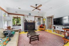  46 Railway Avenue Austinmer NSW 2515 It's all about the potential!!! This original 3 bedroom cottage is positioned on a generous 974m block in a fantastic location, only a short walk from the heart of Austinmer. It's the perfect opportunity to renovate the existing house or start from scratch to create your dream coastal home. YOUR HOME • Despite needing some love and attention, the current house is teeming with vintage character. If you appreciate the charm of yesteryear combined with the conveniences of modern living, this could be the perfect renovator for you. • The large backyard is the perfect space for entertaining friends and family. Enjoy an alfresco meal on the patio while the kids play in the yard, before retiring to the newly built deck at the rear of the property to enjoy a glass of wine while taking in the beautiful views. • Featuring a single lock-up garage with remote door. • A gas fireplace keeps you warm through the winter months and provides a great ambience. • On the lower level of the home, there is plenty of storage along with an additional rumpus room. • Blocks of residential land this size are becoming harder and harder to find. Zoned R2 low density residential with a 15m+ frontage. • Boasts glimpses of the ocean and surrounding bushland, which would be greatly improved by adding a 2nd story (STCA). • Property is situated directly opposite bushland and surrounded by a bush setting, providing you with peace, privacy and tranquility. YOUR LOCATION • This is a highly sought after location, at the end of a quiet cul-de-sac, surrounded by native flora, and only a short walk to the popular beaches, parks, shops, cafes and school. • Embrace that relaxed coastal lifestyle with swimming, fishing, surfing, hiking and sunrise/sunset walks on the beach all available only moments from your doorstep. • The local beach is patrolled and also boasts an ocean pool + great surf break. • Both the train station and bus stop are situated within easy walking distance. • There is also a little-known park just at the end of the street, only seconds from your front door. Perfect for those who like to spend time outdoors without being surrounded by people. • This is one of the most desirable suburbs on this pristine coastline. It is the perfect coastal retreat approximately 1 hour South of Sydney CBD and approximately 30 minutes North of Wollongong CBD. • Austinmer offers a community-based coastal lifestyle with an easy access to Sydney and Wollongong and all that the Northern Illawarra has to offer. 
