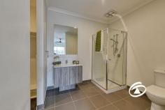  9 Roskopp Ave Clyde North VIC 3978 $630,000 - $670,000 Beautifully maintained inside and out, this modern three-bedroom home presents luxury and low-maintenance living, creating an ideal environment for a relaxed family lifestyle. Nestled in a tranquil enclave within a popular locale, it’s within walking distance to multiple parks and reserves, close to quality schools, and just moments away from shopping facilities and public transport. As you step inside, you'll be welcomed by light-filled interiors that spread across the entire home. A generous hallway leads you past a versatile front living area and opens out to a bright, open-plan living, dining, and kitchen area. Designed to inspire any home chef, the kitchen boasts quality appliances, a gas cooktop, a dishwasher, a walk-in pantry, and a wide breakfast bar. The accommodation comprises three bedrooms. The master bedroom is spacious and equipped with a walk-in wardrobe and ensuite. The secondary bedrooms both have built-in robes and are conveniently serviced by the main bathroom. Glass sliding doors welcome you to a low-maintenance backyard with a mature lush lawn and a concrete patio. Additional benefits include ducted heating, refrigerated cooling, security cameras, double blinds on all windows, a separate laundry, and remote double car accommodation with internal access. 