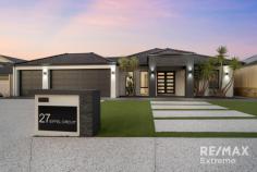  27 Eiffel Cct Tapping WA 6065 $1,000,000 Tapping’s Most Trusted Agents are thrilled to present 27 Eiffel Circuit to the market for your viewing pleasure! This remarkable 4/5-bedroom, 2-bathroom, 3 car garage, residence is simply in a league of its own! Offering resort style living, with style & space for all the family; plus, an amazing outdoor entertainment area overlooking the sparkling pool; this stunning property is guaranteed to take your breath away! Features & benefits include: * Striking front elevation with designer exposed aggregate driveway & feature landscaping * Feature portico leading to double door entrance * Entrance hall with 31 course high ceiling * Home Office / Bed 5 / Nursery * Master bedroom suite with twin walk in robes, through to ensuite with twin vanities, shower & WC * Shoppers access to the triple garage which features rear roller door * Home theatre with recessed ceiling & double doors * Huge open plan family & meals areas with high ceilings * Stunning kitchen with stone benchtops, drop ceiling, pendant lighting over breakfast bar, recessed undermount twin sinks, walk in pantry & fridge recess * Beds 2,3 & 4 are all generous size with sliding door robes * Family bathroom with shower, bath & vanity * Well appointed laundry with double linen press * Powder area with vanity & separate WC * Activity / Study area * Ducted, evaporative air conditioning * Amazing outdoor entertainment area with alfresco & patio providing the perfect space to entertain on a grand scale * Sparking below ground pool with blade water feature & frameless glass pool fencing * Extensive liquid limestone * Bali themed low maintenance landscaped raised planter bed * Triple garage with sealed floor * Large 600sqm block Situated in a highly sought-after, tightly held dress circle location opposite Eiffel Circuit Park, surrounded by quality homes.  