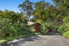  11 Yandala Place Tallebudgera QLD 4228 $1,595,000 When you cherish peace, privacy and natural beauty, this is the sanctuary you've been waiting for. Tucked away in complete tranquillity on a 1.38 acre estate, where towering trees unite with vast open green spaces and a gentle summer creek, it's as if the world melts away once you arrive. A single level home welcomes you at the end of a long driveway, showcasing a renovated stone-clad entry amongst tropical greenery. Views of the glorious grounds follow you throughout, including in the gourmet chefs kitchen. Ample storage, acclaimed appliances and a breakfast bar ensure it's as functional as it is stylish, with the adjacent living room promising a cosy place to curl up by the fire. A formal lounge and dining room and sunroom also feature, providing the freedom to spend time together or apart, along with four spacious bedrooms and two bathrooms. Led by an oversized master suite with walk-in robe and ensuite, it's a lovely place to retreat at the day's end. It's outdoors though that will soothe your soul. Dive into the refreshing saltwater pool or soak away any stress in the spa, all while enveloped by a blissful bushland canopy that ensures complete privacy. The poolside pavilion offers another vantage point to take in the natural wonderland, as does the wraparound alfresco entertaining area, perfect for hosting guests against a stunning bushland backdrop. Additionally, take advantage of secure parking for five cars across two separate carports plus a 6m x 6m double bay work shed with a large, covered annexe. Ideally located to deliver both seclusion and convenience, Tallebudgera State School and St Andrews Lutheran College await within approx. 10 minutes. When you're craving surf and sand, pick between the pristine Burleigh, Palm Beach and Currumbin coastlines, situated within a 15-18 minute radius. Experience this estate's enchantment, serenity and seclusion first-hand – arrange an inspection today. House Features: Single level home with a renovated stone-clad entry, immersed within tropical greenery Lush and leafy views of the estate follow you throughout the home Renovated kitchen with 6-burner gas cooktop, centre island with Vintec wine fridge, Miele dishwasher, ample storage, breakfast bar and leafy views Living room with cosy fireplace Formal lounge and dining room flows into an enclosed sunroom Oversized master suite with walk-in robe and ensuite Four spacious bedrooms with built-in robes ( one currently used as office ) Main bathroom with separate toilet Laundry with external access Oversized carport Ducted air-conditioning Ceiling fans throughout Vast wraparound alfresco entertaining area, refurbished with new roof Saltwater pool and spa surrounded by a blissful bushland canopy Poolside pavilion with spa Property Features: 1.38 acre estate punctuated by towering trees, a summer creek and open green spaces Set well back from the street, accessed by a sealed and forked driveway 6.5m x 6m double carport 6m x 6m double bay work shed with 5.4m x 2.5m covered annexe 3m x 3m garden shed Water tank 7,500 litres 26 solar panels NBN Location: Approx. 6 mins to Tallebudgera State School Approx. 10 mins to St Andrews Lutheran College Approx. 13 mins to The Pines, Elanora Approx. 15 mins to Burleigh Heads Approx. 16 mins to Palm Beach Approx. 18 mins to Currumbin Beach Approx. 24 mins to Gold Coast Airport Approx. 29 mins to Surfers Paradise 