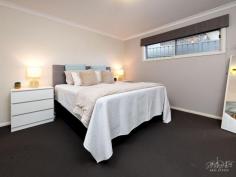  36 Silky Oak Ave Wodonga VIC 3690 $949,000 Discover the perfect blend of elegance and functionality in this thoughtfully designed, spacious family home, just moments from Wodonga CBD. From its striking façade to the luxurious inground spa and swimming pool, every detail has been crafted to impress. The master suite is privately positioned away from the other bedrooms and features a well-appointed ensuite with dual basins, a double shower, and a walk-in robe. The three additional bedrooms include walk-in robes in two and a built-in robe in the fourth, all sharing the full family bathroom. With multiple living options, this home provides space for every occasion. It includes a home office with a built-in desk, a rumpus room for private escapes, a theatre room with a projector, and an open-plan kitchen, living, and dining area for family gatherings. The entertainer’s kitchen is the heart of the home, featuring stainless steel appliances, including two electric ovens, an induction cooktop, a dishwasher, a generous walk-in pantry, and an extensive island bench. Sliding doors offer seamless indoor-outdoor flow to the covered alfresco area, where you can entertain with ease while watching the kids and pets play in the grounds, complete with a chicken run and coop. The stunning 10m salt-chlorinated pool and spa provide a tranquil escape on hot summer days, complete with solar heating, umbrellas, a pool blanket, and phone connectivity. Designed with comfort in mind, the home features zoned hydronic floor heating, evaporative cooling, and quality blinds throughout. A 4.5kW solar panel system helps keep your bills to a minimum. The oversized double garage accommodates your vehicles and offers both remote and internal access along with additional storage space. Additional off street parking is available and dual gates on the side of the property provide access to the rear yard, perfect for adding a shed if desired. Additional features include full laundry facilities with a walk-in linen closet, a third toilet, and an impressive 4K security camera system, among others. This family home is a must-see, located with easy access to the WhiteBox shopping complex, Waves Aquatic Centre, schools, sporting grounds, Bunnings Homemaker Centre, and just minutes from Wodonga’s CBD. We welcome your enquiry and inspection. 