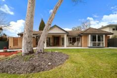  9 Dennes Place Lyons ACT 2606 $1,350,000 Blending sophisticated style with tasteful contemporary updates, this welcoming residence is set in one of the most coveted pockets of Lyons. A statement home in a lifestyle address, near public transport, parklands, cafes, dining, and sought-after schools. Brimming with an abundance of space all in a stunning garden setting on an expansive 1049m2 block. Step through the formal entry to discover the heart of this inviting north facing home. Opulent parquetry flooring gives an immediate sense of style. The quality kitchen is a dream for culinary enthusiasts, featuring extensive storage, dishwasher, stainless steel appliances, induction cooktop, integrated dishwasher and walk-in pantry. The bedroom wing of the house is cleverly sectioned off from the family living spaces to create privacy, with double glazed windows ensuring the bedrooms and bathroom are cosy and warm. Stylishly updated, the family bathroom features elegant tiles and cabinetry, luxurious bath and oversized shower. Spacious and bright, with ensuite and custom wall-to-wall built-in robes, the master bedroom is a peaceful retreat to enjoy quiet moments. Venture outside to the expansive back entertainment patio. Large enough for big family gatherings, it offers an idyllic view of the expansive garden with level lawn and delightful Magnolia hedge. This home exudes a sense of pride and care. Its landscaped front garden adds elegance to its street appeal. The huge block offers so much potential to add a pool, an extension or even a second residence. Situated minutes from Woden, Weston Creek and local shops you can take your pick of cafes, restaurants and entertainment options. School catchments include; Lyons Early Childhood School, Curtin Primary, Hughes Primary and Alfred Deakin High School. This home has been updated with love - now it's time for one lucky family to make this home their own. Your new home features: An expansive 1,042m2 block with level lawns and an 180m2 entertainment patio North facing living areas with opulent parquetry flooring throughout Quality kitchen with stainless steel appliances, induction cooktop, integrated dishwasher, walk-in pantry and breakfast nook Enclosed north facing private entertaining courtyard with new aluminium privacy screen Spacious master suite with ensuite and custom wall-to-wall built-in robes Stylish family bathroom with luxury fittings Double glazed windows to rear of home Split system in living room Plenty of in house and under house storage Secure remote access single carport and lock up garage Beautifully landscaped front and rear gardens Potential to add a pool, an extension or even a second residence. Colorbond fencing and side gate Close to Canberra Hospital, Woden Bus Interchange and Future Light Rail Link A short walk to the local Lyons shops, Stand by Me cafe, IGA, Westfield Woden and Oakey Hill reserve. This property is in the school catchment for Lyons Early Childhood School, Curtin Primary, Hughes Primary and Alfred Deakin High School. 