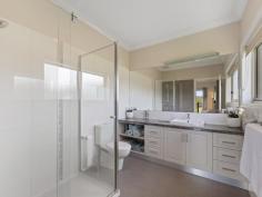  23 Powells Rd Foster VIC 3960 $1,185,000 Set on approx 1 ha of useable fenced land in the popular Golden Creek area at the base of the Hoddle range, just 8 mins from Foster, 10 mins from beautiful Waratah Bay beach, 15 mins to Wilson's prom gateway, this appealing property has been fastidiously maintained inside and out. Cleverly designed to maximise the outlook over the surrounding countryside and glimpses of Wilsons Prom. Offering the perfect alternative to a new build. Energy saving features include double glazing, solar power on a high feed in, zoned RC/AC for heating and cooling in living areas, office and main bedroom. Stunning polished jarrah flooring compliments the neutral décor and every living space opens out onto a deck - perfect for entertaining. Light filled living room with stylish Jotul wood heater. Superbly appointed central kitchen with rich timber cabinetry, stainless steel appliances and a large breakfast bar to the dining room. Master bedroom with WIR & ensuite bathroom plus a light filled home office/4th bedroom with perfectly placed picture windows. Upstairs to a spacious family room with raked ceilings, extensive glazing and balcony with pastoral views. Two further fitted bedrooms are serviced by a central family bathroom. The interior layout is ideal for accommodating a growing or extended family, or even to utilize part as a BnB. There are so many thoughtful inclusions - a large light filled laundry with stone bench, extra-large double garage with auto doors, storage area & direct access to the home. Additional garage/shed/workshop/studio with concrete floor, lights, power & water plus graveled parking area for a boat/caravan. Established vegetable beds & 60,000l of static water. Fenced paddock with room for a few sheep, alpacas or a pony. Sure to delight even the most fastidious buyer this is a property you will love to come home to. 