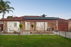  5 Allington Place Langwarrin VIC 3910 $749,000 - $799,000 Holding a privileged address within one of Langwarrin's most convenient enclaves, this beautifully enhanced home delivers instant appeal for modern families or retirees seeking a hassle-free lifestyle in the heart of Langwarrin. Brimming with space and seclusion, the three-bedroom home artfully blends modern updates with thoughtful inclusions to create an inviting setting across two distinct living zones, open dining space and an almost-new kitchen. Making entertaining on a large scale an easy task, the culinary domain features a large walk-in pantry, Westinghouse pyrolytic oven, a 900mm gas cooktop, soft-close cabinetry and stone waterfall benchtops. A fluid indoor-outdoor design promises perfect all-season space, as a large covered alfresco links with a protected above-ground spa, and a rear yard with a fire pit and garden shed. The three-bedroom 2-bathroom floorplan keeps kids together within a private wing alongside the main bathroom with separate toilet, while the master bedroom with walk-in robe and dual-vanity ensuite provides parents with their own privacy. A solid wood heater brings a natural warmth across the rear entertaining footprint, while split-system heating and cooling and gas ducted heating offer push-button convenience. Complete with plantation shutters, ceiling fans, a fully-lined single garage with internal access and a rear storage room, a 6.5kW solar system and ample off-street parking inclusive of separate caravan/boat storage. A convenient position only paces from Langwarrin Plaza, Woodlands Primary School and public transport sees Langwarrin's amenity-rich landscape remain within easy reach. 