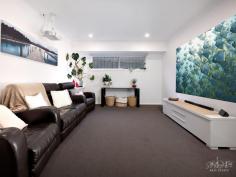  36 Silky Oak Ave Wodonga VIC 3690 $949,000 Discover the perfect blend of elegance and functionality in this thoughtfully designed, spacious family home, just moments from Wodonga CBD. From its striking façade to the luxurious inground spa and swimming pool, every detail has been crafted to impress. The master suite is privately positioned away from the other bedrooms and features a well-appointed ensuite with dual basins, a double shower, and a walk-in robe. The three additional bedrooms include walk-in robes in two and a built-in robe in the fourth, all sharing the full family bathroom. With multiple living options, this home provides space for every occasion. It includes a home office with a built-in desk, a rumpus room for private escapes, a theatre room with a projector, and an open-plan kitchen, living, and dining area for family gatherings. The entertainer’s kitchen is the heart of the home, featuring stainless steel appliances, including two electric ovens, an induction cooktop, a dishwasher, a generous walk-in pantry, and an extensive island bench. Sliding doors offer seamless indoor-outdoor flow to the covered alfresco area, where you can entertain with ease while watching the kids and pets play in the grounds, complete with a chicken run and coop. The stunning 10m salt-chlorinated pool and spa provide a tranquil escape on hot summer days, complete with solar heating, umbrellas, a pool blanket, and phone connectivity. Designed with comfort in mind, the home features zoned hydronic floor heating, evaporative cooling, and quality blinds throughout. A 4.5kW solar panel system helps keep your bills to a minimum. The oversized double garage accommodates your vehicles and offers both remote and internal access along with additional storage space. Additional off street parking is available and dual gates on the side of the property provide access to the rear yard, perfect for adding a shed if desired. Additional features include full laundry facilities with a walk-in linen closet, a third toilet, and an impressive 4K security camera system, among others. This family home is a must-see, located with easy access to the WhiteBox shopping complex, Waves Aquatic Centre, schools, sporting grounds, Bunnings Homemaker Centre, and just minutes from Wodonga’s CBD. We welcome your enquiry and inspection. 
