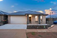  13 Willow Drive Munno Para SA 5115 $599,000-$649,000 Nestled in a vibrant and growing community, this beautifully presented 3-bedroom, 2-bathroom home offers the perfect blend of comfort, style, and convenience. Built circa 2023, situated on a 375m2 corner allotment with a thoughtful layout designed to accommodate modern family living. This property boasts not just one but two generous living spaces, making it ideal for both quiet evenings at home and lively gatherings with friends and family. KEY FEATURES - Master bedroom with ensuite, walk-in-robe and electric shutters to the front windows - Bedrooms 2 and 3 equipped with built in robes - Chef’s kitchen equipped with a 5-burner gas cooktop, island, ample bench and cupboard space with sleek modern cabinetry, walk-in-pantry and stainless-steel appliances - Open plan living and dining flow seamlessly together from the kitchen, creating a warm and inviting space for everyday living - Central second living space, perfect for family gatherings, entertaining guests, or creating a cosy retreat - Central storeroom, providing ample space for all your storage needs - Alfresco offering outdoor entertaining via sliding door access - Ducted reverse cycle heating and cooling throughout with wi-fi compatibility - Low-maintenance front and rear yards with ample room for outdoor activities and relaxation Whether you’re a first-time homebuyer searching for your dream start, a growing family in need of more space, or an investor seeking a valuable addition to your portfolio, this home has something special for everyone. Its prime location ensures you’re never far from essential amenities, including schools, parks, shopping centres, and public transport, making daily life both easy and enjoyable. Don’t miss out on this exceptional home, enquire today to avoid disappointment! Specifications: CT / 6268/703 Council / Playford Zoning /SAC Built / 2023 Land / 375m2 Council Rates / $2,793.46pa SA Water / $165.55pq Written rental assessment can be provided upon request Nearby Schools / Mark Oliphant College (B-12), Munno Para P.S, Swallowcliffe School P-6, Kaurna Plains School 