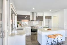  4 Fulton St Officer VIC 3809 $790,000-$830,000 Offering a desirable lifestyle in the new Park Central Estate in Officer, this modern home with striking street appeal is not one to miss. Boasting three distinct living areas, it provides an abundance of space for relaxation and entertainment, including a dedicated kids’ retreat, ensuring everyone in the family has their own area to unwind. Featuring four spacious bedrooms, master suite with a walk-in robe and an ensuite. The remaining three bedrooms are generously sized and include built-in robes for ample storage. The heart of the home is the large and well appointed kitchen, equipped with premium stainless steel appliances, 900mm oven, a walk-in pantry, stone benchtops, and soft-close drawers. Additional features of this home include security doors, stackable doors ideal for entertaining, and bifold windows that open from the kitchen to the alfresco area. The home is equipped with ducted heating and split system cooling for year-round comfort. The double remote garage offers secure parking, while the landscaped, low-maintenance gardens enhance the home's appeal. Conveniently located near the freeway, parkland, public transport, local shops, a variety of public and private schools including Haileybury, Beaconhills and St Francis this home offers easy access to all essential amenities, combining luxury with practicality in a perfect family setting. 