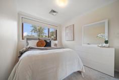  9 Dennes Place Lyons ACT 2606 $1,350,000 Blending sophisticated style with tasteful contemporary updates, this welcoming residence is set in one of the most coveted pockets of Lyons. A statement home in a lifestyle address, near public transport, parklands, cafes, dining, and sought-after schools. Brimming with an abundance of space all in a stunning garden setting on an expansive 1049m2 block. Step through the formal entry to discover the heart of this inviting north facing home. Opulent parquetry flooring gives an immediate sense of style. The quality kitchen is a dream for culinary enthusiasts, featuring extensive storage, dishwasher, stainless steel appliances, induction cooktop, integrated dishwasher and walk-in pantry. The bedroom wing of the house is cleverly sectioned off from the family living spaces to create privacy, with double glazed windows ensuring the bedrooms and bathroom are cosy and warm. Stylishly updated, the family bathroom features elegant tiles and cabinetry, luxurious bath and oversized shower. Spacious and bright, with ensuite and custom wall-to-wall built-in robes, the master bedroom is a peaceful retreat to enjoy quiet moments. Venture outside to the expansive back entertainment patio. Large enough for big family gatherings, it offers an idyllic view of the expansive garden with level lawn and delightful Magnolia hedge. This home exudes a sense of pride and care. Its landscaped front garden adds elegance to its street appeal. The huge block offers so much potential to add a pool, an extension or even a second residence. Situated minutes from Woden, Weston Creek and local shops you can take your pick of cafes, restaurants and entertainment options. School catchments include; Lyons Early Childhood School, Curtin Primary, Hughes Primary and Alfred Deakin High School. This home has been updated with love - now it's time for one lucky family to make this home their own. Your new home features: An expansive 1,042m2 block with level lawns and an 180m2 entertainment patio North facing living areas with opulent parquetry flooring throughout Quality kitchen with stainless steel appliances, induction cooktop, integrated dishwasher, walk-in pantry and breakfast nook Enclosed north facing private entertaining courtyard with new aluminium privacy screen Spacious master suite with ensuite and custom wall-to-wall built-in robes Stylish family bathroom with luxury fittings Double glazed windows to rear of home Split system in living room Plenty of in house and under house storage Secure remote access single carport and lock up garage Beautifully landscaped front and rear gardens Potential to add a pool, an extension or even a second residence. Colorbond fencing and side gate Close to Canberra Hospital, Woden Bus Interchange and Future Light Rail Link A short walk to the local Lyons shops, Stand by Me cafe, IGA, Westfield Woden and Oakey Hill reserve. This property is in the school catchment for Lyons Early Childhood School, Curtin Primary, Hughes Primary and Alfred Deakin High School. 