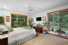  11 Yandala Place Tallebudgera QLD 4228 $1,595,000 When you cherish peace, privacy and natural beauty, this is the sanctuary you've been waiting for. Tucked away in complete tranquillity on a 1.38 acre estate, where towering trees unite with vast open green spaces and a gentle summer creek, it's as if the world melts away once you arrive. A single level home welcomes you at the end of a long driveway, showcasing a renovated stone-clad entry amongst tropical greenery. Views of the glorious grounds follow you throughout, including in the gourmet chefs kitchen. Ample storage, acclaimed appliances and a breakfast bar ensure it's as functional as it is stylish, with the adjacent living room promising a cosy place to curl up by the fire. A formal lounge and dining room and sunroom also feature, providing the freedom to spend time together or apart, along with four spacious bedrooms and two bathrooms. Led by an oversized master suite with walk-in robe and ensuite, it's a lovely place to retreat at the day's end. It's outdoors though that will soothe your soul. Dive into the refreshing saltwater pool or soak away any stress in the spa, all while enveloped by a blissful bushland canopy that ensures complete privacy. The poolside pavilion offers another vantage point to take in the natural wonderland, as does the wraparound alfresco entertaining area, perfect for hosting guests against a stunning bushland backdrop. Additionally, take advantage of secure parking for five cars across two separate carports plus a 6m x 6m double bay work shed with a large, covered annexe. Ideally located to deliver both seclusion and convenience, Tallebudgera State School and St Andrews Lutheran College await within approx. 10 minutes. When you're craving surf and sand, pick between the pristine Burleigh, Palm Beach and Currumbin coastlines, situated within a 15-18 minute radius. Experience this estate's enchantment, serenity and seclusion first-hand – arrange an inspection today. House Features: Single level home with a renovated stone-clad entry, immersed within tropical greenery Lush and leafy views of the estate follow you throughout the home Renovated kitchen with 6-burner gas cooktop, centre island with Vintec wine fridge, Miele dishwasher, ample storage, breakfast bar and leafy views Living room with cosy fireplace Formal lounge and dining room flows into an enclosed sunroom Oversized master suite with walk-in robe and ensuite Four spacious bedrooms with built-in robes ( one currently used as office ) Main bathroom with separate toilet Laundry with external access Oversized carport Ducted air-conditioning Ceiling fans throughout Vast wraparound alfresco entertaining area, refurbished with new roof Saltwater pool and spa surrounded by a blissful bushland canopy Poolside pavilion with spa Property Features: 1.38 acre estate punctuated by towering trees, a summer creek and open green spaces Set well back from the street, accessed by a sealed and forked driveway 6.5m x 6m double carport 6m x 6m double bay work shed with 5.4m x 2.5m covered annexe 3m x 3m garden shed Water tank 7,500 litres 26 solar panels NBN Location: Approx. 6 mins to Tallebudgera State School Approx. 10 mins to St Andrews Lutheran College Approx. 13 mins to The Pines, Elanora Approx. 15 mins to Burleigh Heads Approx. 16 mins to Palm Beach Approx. 18 mins to Currumbin Beach Approx. 24 mins to Gold Coast Airport Approx. 29 mins to Surfers Paradise 
