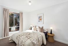  18D Waterman Terrace Mitchell Park SA 5043 $715,000 - $755,000 Quietly located down the pencil pine-lined driveway this courtyard home enjoys a spacious floorplan and a north-facing alfresco with plenty of room to move. A generous front garden offers wonderful privacy as well as being low maintenance, before a large open plan living, dining and kitchen area welcomes you upon entry. Light and airy home cooks will feel right at home in the contemporary kitchen with large island and breakfast bar, gas cooktop, double sink and substantial storage as well as views to the alfresco. Sliding doors allow to easy access onto the paved outdoor area complete with expansive pitched roof pergola and bordered by garden beds of fruit trees and ornamentals. Three carpeted bedrooms in their own wing include a comfortable master with built-in robes, ceiling fan and front garden outlook, each serviced by a family-sized bathroom with inset bath, shower and large vanity. Lots more to love: - Large pitched roof outdoor entertaining area - Split system air conditioner to living - Linen storage - Separate laundry with outside access + second toilet - Double lock up carport plus extra off-street parking - Solar panels It's a top location for convenience. Walk to the bus and train, Mitchell Park Oval, local schools (Westminster, Hamilton Secondary College, Clovelly Park Primary, Sacred Heart College), Quick Road Reserve, Marion Hotel & Cellars and Foodland, and just minutes from Tonsley, Flinders University and Westfield Marion. City commutes are a simple 10kms and the sea is only 5(kms). 