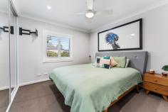  1/24 Boomerang Street Helensburgh NSW 2508 Situated on a highly sought after street, this stylish townhouse perfectly combines peace and convenience, just a short distance from all of Helensburgh's amenities. With three spacious bedrooms, modern finishes throughout and a spacious, fully grassed backyard , this home is an opportunity you won't want to miss! Your Home • Flooded with natural light, this home offers a bright and airy atmosphere all day long. • Featuring three spacious bedrooms, each with built-in wardrobes, the master bedroom boasting a large ensuite. • Enjoy outdoor gatherings with family and friends on your outdoor entertaining deck while children and pets play safely in the fully fenced yard. • Ample storage throughout the home. • Air conditioning on the lower level and ceiling fans on the top level for year-round comfort. • Remote-controlled lock-up garage with internal access. • Ideal for first-time buyers, downsizers, or investors. • Conveniently located just minutes from shops, sporting fields, schools, and public transport. • The open-plan lounge and dining area is air-conditioned for comfort in every season. Your Lifestyle • Located close to shops, cafes, restaurants, transport, playgrounds and the free public swimming pool. • Picturesque Stanwell Park Beach is less than 15 minutes drive. Enjoy Coastal living without the huge price tag. • This is one of the only remaining areas where you can find a peaceful regional lifestyle less than an hour from Sydney. It offers all of those charming lifestyle benefits that one would associate with small town living:- bushwalking, swimming holes, bike tracks, sporting clubs, cafes and of course plenty of friendly people. Only 45 minutes South of Sydney and 30 minutes North of Wollongong. 