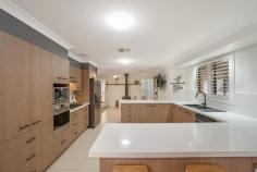 7 Pinetree Pl Ashtonfield NSW 2323 $950,000 - $1,030,000 – A fresh new look and feel throughout with many upgrades including modern aluminium plantation shutters. – Potential fifth bedroom if required. – Four double bedrooms all built in robes plus ceiling fans, the Master bedroom offers a full-size bathroom with updated fittings and look. – Stylish cabinetry with a brand-new stone benchtop, splashback & black granite sink & matching tapware. – Climate control- Brand new Daikin ducted air conditioning system with zoning, ceiling fans throughout, reverse cycle split system & brand-new slow combustion fire. – Spacious living with large home theatre room or potential fifth bedroom. – The games room is a must see! 9.0m x 4.5m holding a pool table that can be included with the sale. Perfect for all seasons. – Garaging & storage, attached 6.0m x 6.0 garage with epoxy flooring & storage cabinets, plus a 4.0m x 5.0m detached Colourbond shed fully insulated and ideal for extra storage, home office, or studio. Off street parking for a caravan, boat or extra cars. – Very secure entry with a 1.8m high electric remote gate. – Energy efficiency with 18 solar panels, 6kw system and five 1000ltr water tanks that can easily supply the Colourbond shed. – Location and lifestyle set on a private 768m2 block, this home is just minutes from Stockland Greenhills, the new Maitland Hospital, public and private schools, and local transport all within a 30 minute commute to the Newcastle CBD 