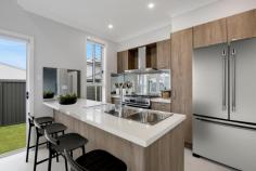 1 Flat Sedge Crescent Huntley NSW 2530 $1,050,000 A brand new home ready to move in and enjoy presents here at 1 Flat Sedge Crescent, Huntley. This Sundancer home constructed by Kaplan homes, is the perfect opportunity to secure a brand new quality home without the headaches of going through the building process. Located in Forest Reach Estate at the base of the escarpment, this home is ideal for young families, investors, professional couples and downsizers. Featuring quality fixtures and fittings throughout and a low maintenance design, this is your chance to own a brand new home with a gorgeous escarpment outlook in a fantastic new housing estate. Featuring • 4 bedrooms • Master with built in wardrobe and ensuite • All bedrooms with built in wardrobes • Well appointed kitchen • Interface Alarm system • Ducted Air conditioning • Solar panels 3kw solar system • Camera system • Electronic instantaneous hot water system • Side access parking for trailer or boat • Fully fenced rear yard 
