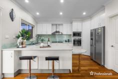  32 Oakleigh Crescent Ormond VIC 3204 $1,280,000-$1,350,000 Immaculately presented, this spacious double-story home exudes elegance and the warmth of family living, seamlessly blending location with lifestyle in the highly sought-after McKinnon Secondary Zone. The free-flowing design effortlessly connects the open living area, featuring a gas fireplace, to a light-filled dining space with a charming bay window and an entertainer’s kitchen, complete with a breakfast bar. Enhancing the home’s entertaining appeal is a sunroom, thoughtfully equipped with cabinetry and a sink. The home boasts four generously sized bedrooms, all with built-in robes. The master bedroom, located downstairs, impresses with its walk-through robe and ensuite. Additionally, a central bathroom with a separate toilet adds to the home’s functionality. Timber floorboards run throughout, adding warmth and style, complemented by a downstairs powder room, a fully fitted home office, and a large landing area at the top of the stairs, ideal as a kids’ retreat. The large laundry with built-in storage and a paved outdoor area add to the home’s practicality. Quality features include ducted heating/air conditioning, double-glazed windows, a garden shed, a water tank, under-stair storage, and a double garage with internal access. This home is perfectly positioned within the zones for both McKinnon Primary and Secondary schools, with close proximity to Kilvington Grammar, Caulfield Grammar, Joyce Park, Chadstone Shopping Centre, and walking distance to the shops, cafes, restaurants, and transport on North Road. 