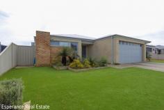  7 Magistrate Drive Castletown WA 6450 This amazing family home is situated in a sought-after suburb and definitely one to add to your house-hunting hit list. Beautifully designed 5 bedroom, 2 bathroom home perfectly balances style and functionality. The open-plan living area is the heart of the home, with deluxe, galley style kitchen, boasting modern appliances and ample storage, overlooks the open plan living with patio extension. The master suite is a true retreat, featuring a private, fenced patio with a relaxing spa bath where you can unwind in complete privacy amongst the lush garden sanctuary. There are 3 minor bedrooms and for those needing extra space, the home also features a versatile study that can easily serve as a 5th bedroom, complete with a private entry door-ideal for guests or a home office. Enjoy the convenience of rear access ideal for secure caravan or boat storage and a double garage UMR, providing ample space for vehicles and storage. The property is further enhanced by a garden shed and a water softener that ensures a high-quality water supply throughout the home. This is an opportunity to own a home that caters to every need, blending comfort, luxury and practicality. 