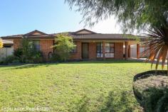  20 Wildcherry Avenue Castletown WA 6450 Discover this well-maintained 3 bedroom brick veneer and tile home, perfect for owner occupier or those looking for a neat investment. The property boasts a formal lounge, a compact yet functional kitchen with a walk-in pantry, and an adjacent dining area. Enjoy the warmth and elegance of new timber floor coverings throughout with added bonus of 2 airconditioning units. The recently remodeled bathroom and laundry add a touch of luxury, ensuring modern comfort. Step outside to the inviting patio, with approval for extension with works about to commence- ideal for entertaining plus convenient rear yard access to a powered double garage. Additionally, a single carport under the main roof offers extra parking or storage space. 